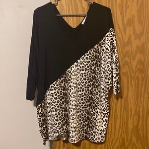NWOT asymmetrical leopard/black dressy top. What’s not to love about Leopard?!